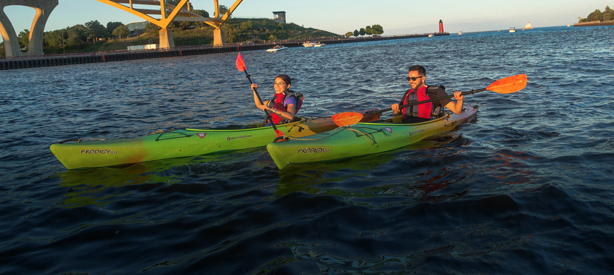 People kayaking on the Milwaukee River People kayaking on the Milwaukee River
