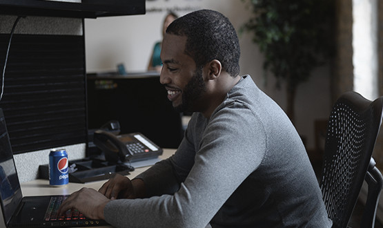 man working on a laptop