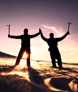 Two men hiking in snow