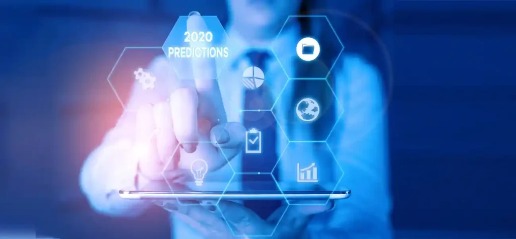 man pointing to screen 2020 predictions