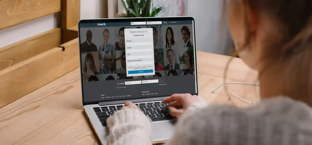 person at laptop with Linkedin