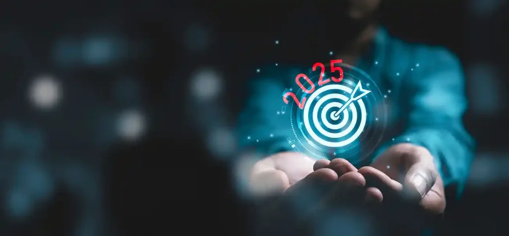 hands holding 2025 with target