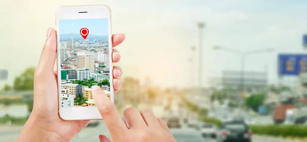 hands holding phone searching location
