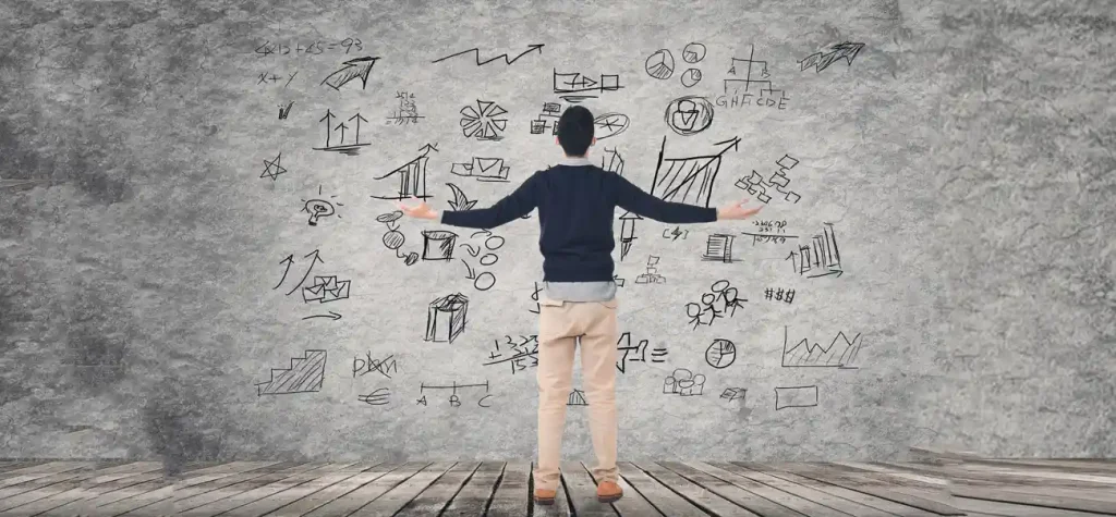person in front of white board