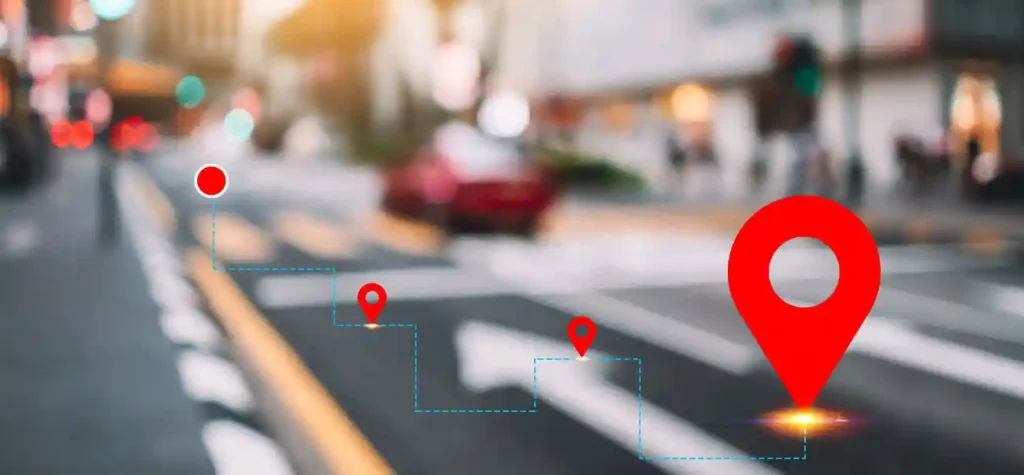 location marker on blurred street scene