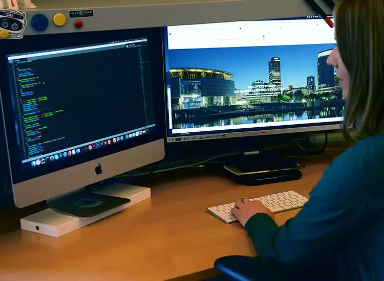 employee looking at computer