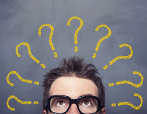 man with glasses questions above head